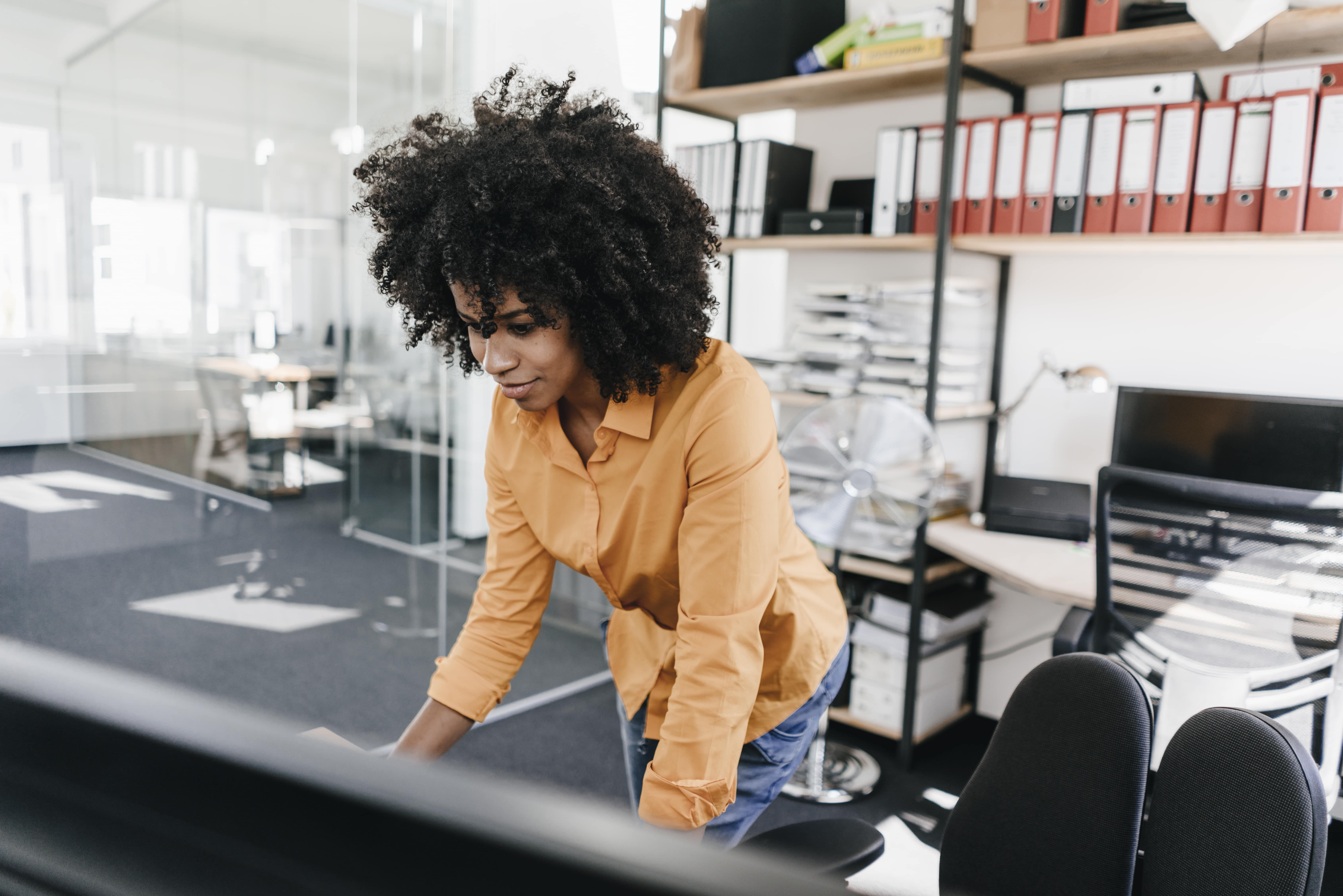 young-woman-working-in-office-2022-03-08-01-25-23-utc-min